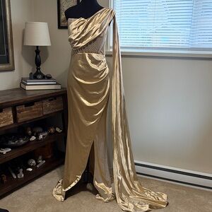 Elegant Gold Draped Evening Gown with Long Train